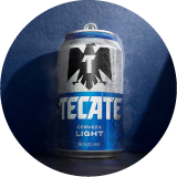 A mug of mixed Tecate® Original with clam juice and ice.